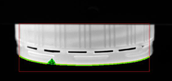 VisionCheck machine vision inspection showing multiple plastic caps with missing edge material defects